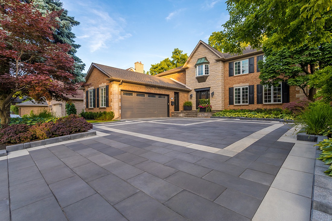 Spacious modern home with landscaped front yard.