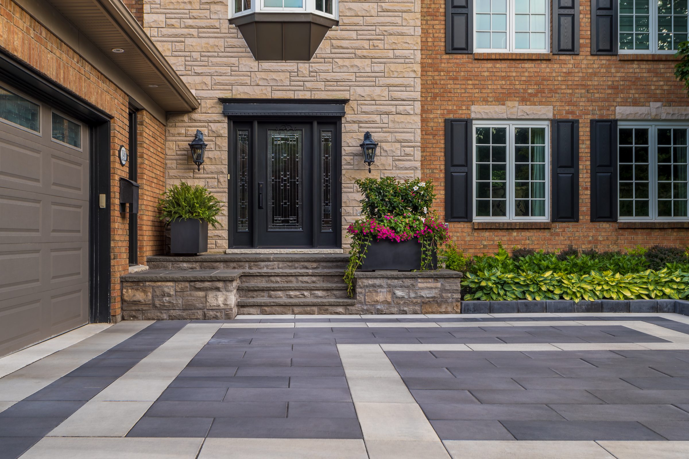Modern home exterior with brick and stone facade