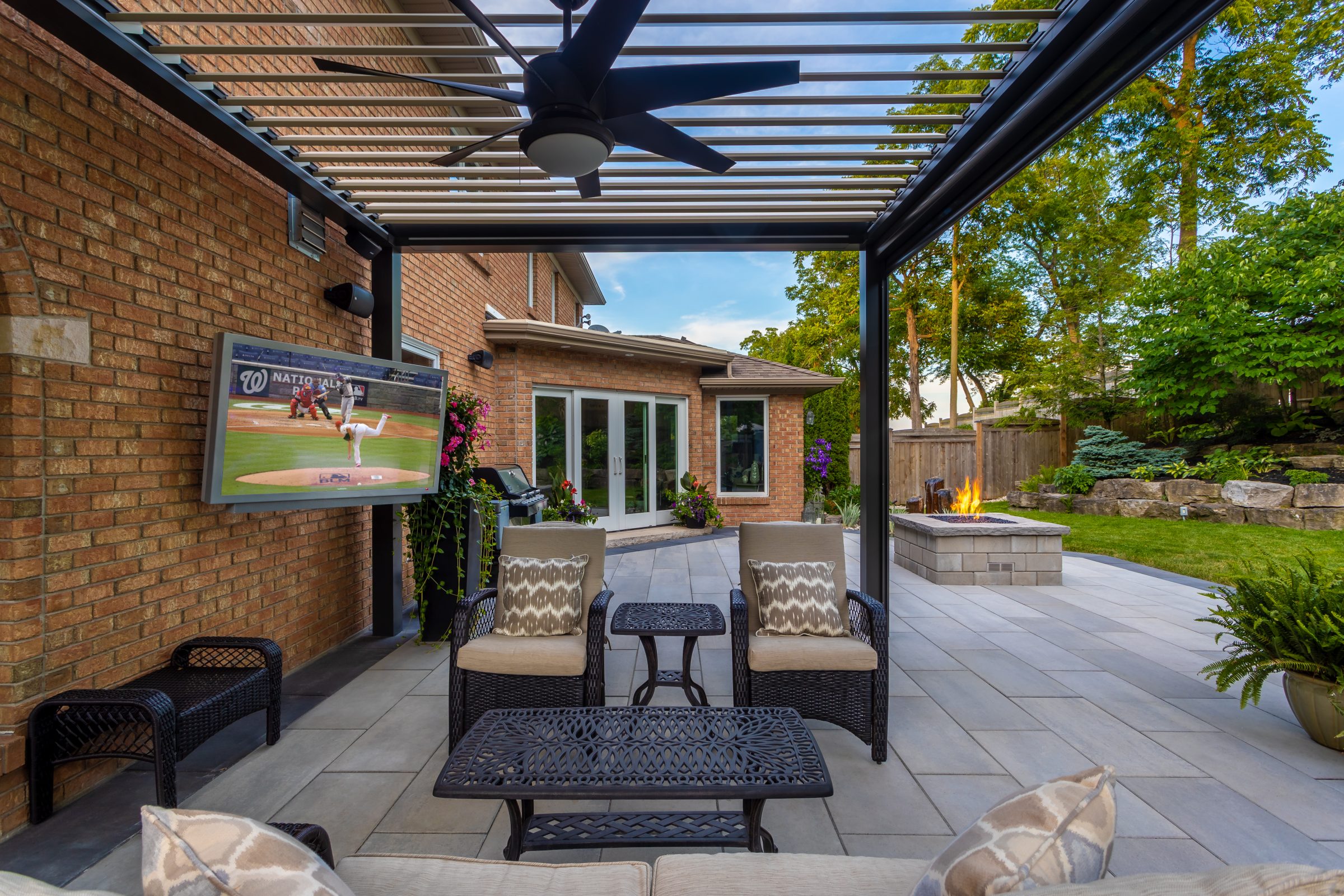Modern patio with TV and fire pit