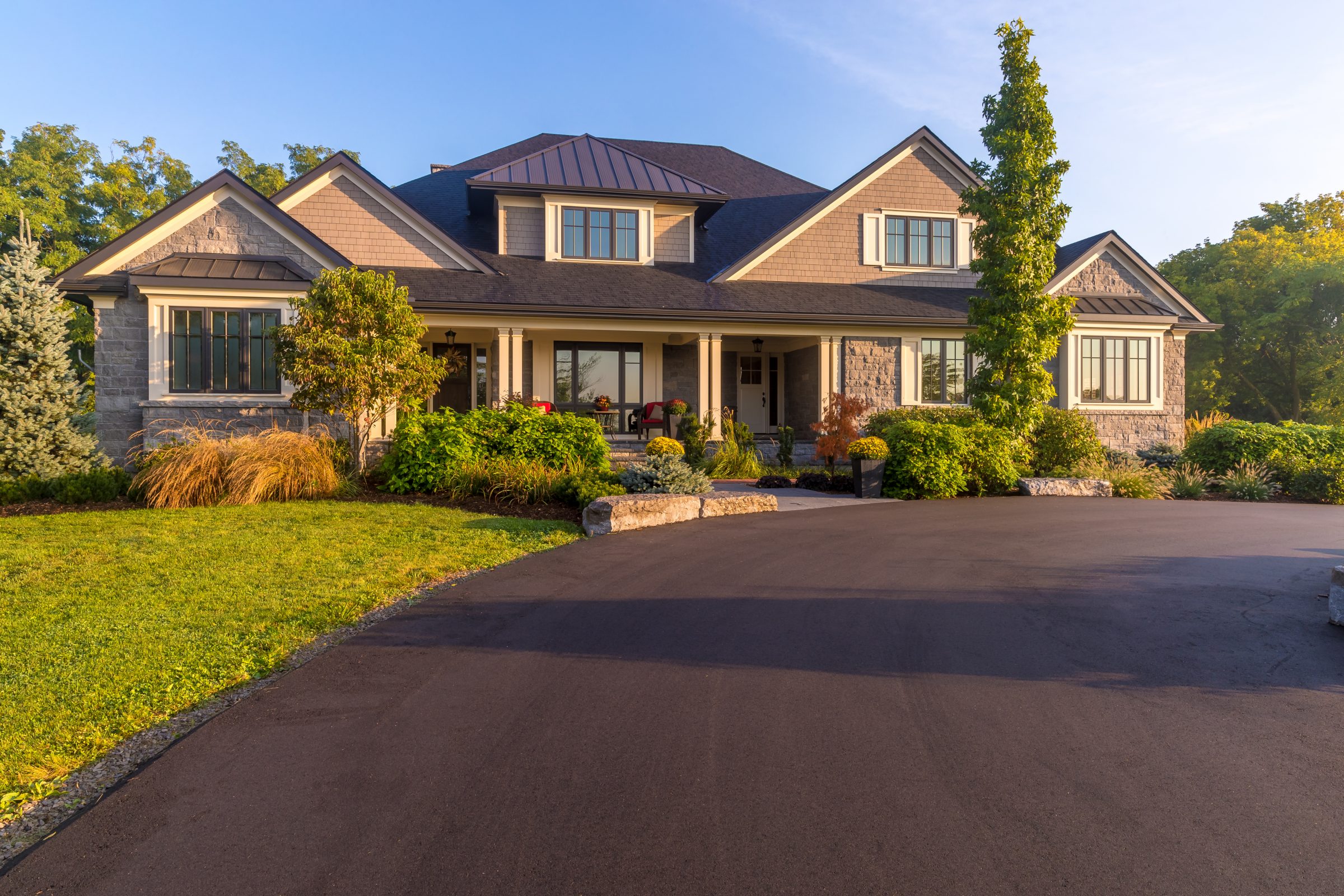 Modern suburban house with landscaped front yard