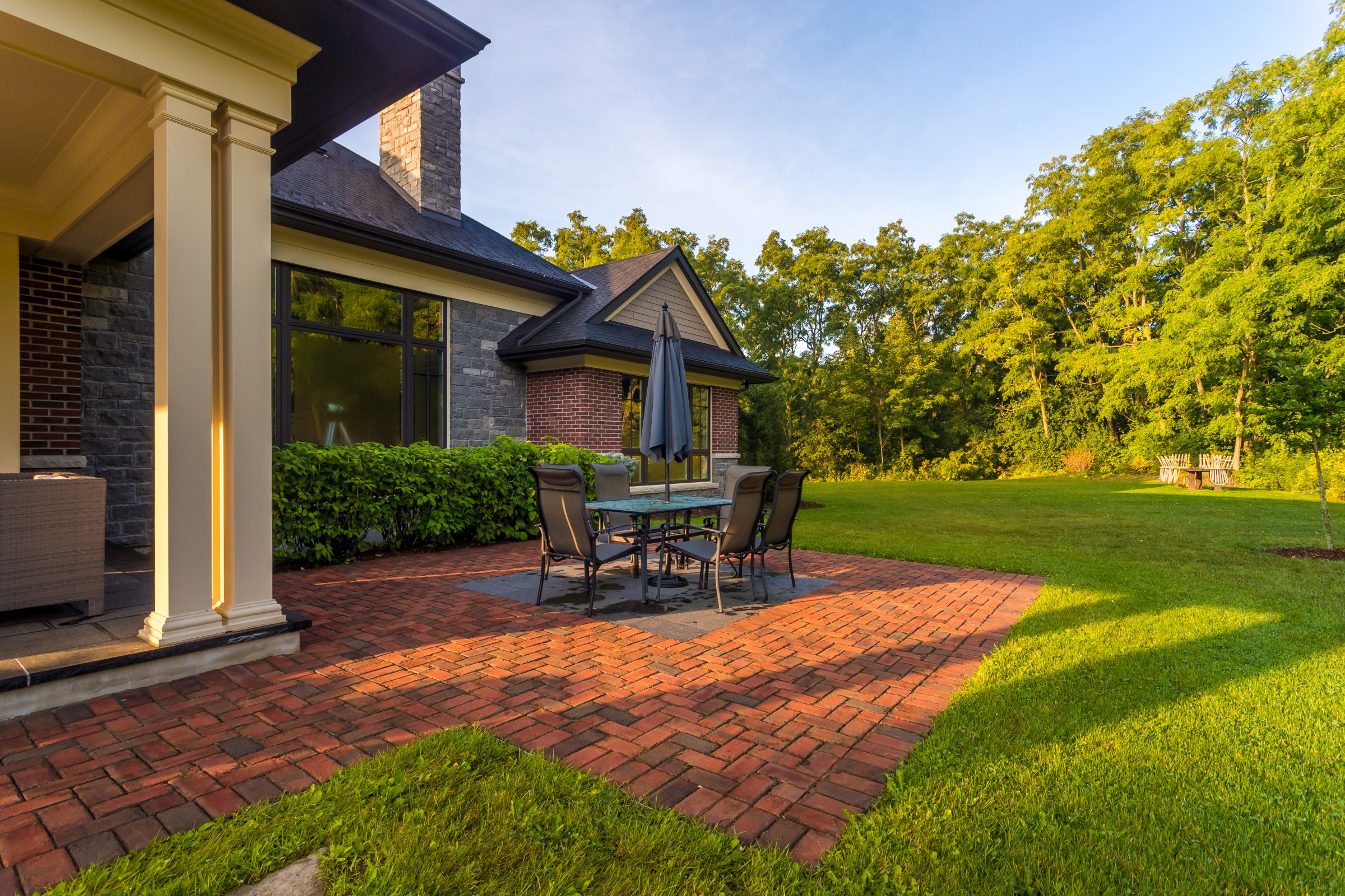Patio with table, chairs, and garden view