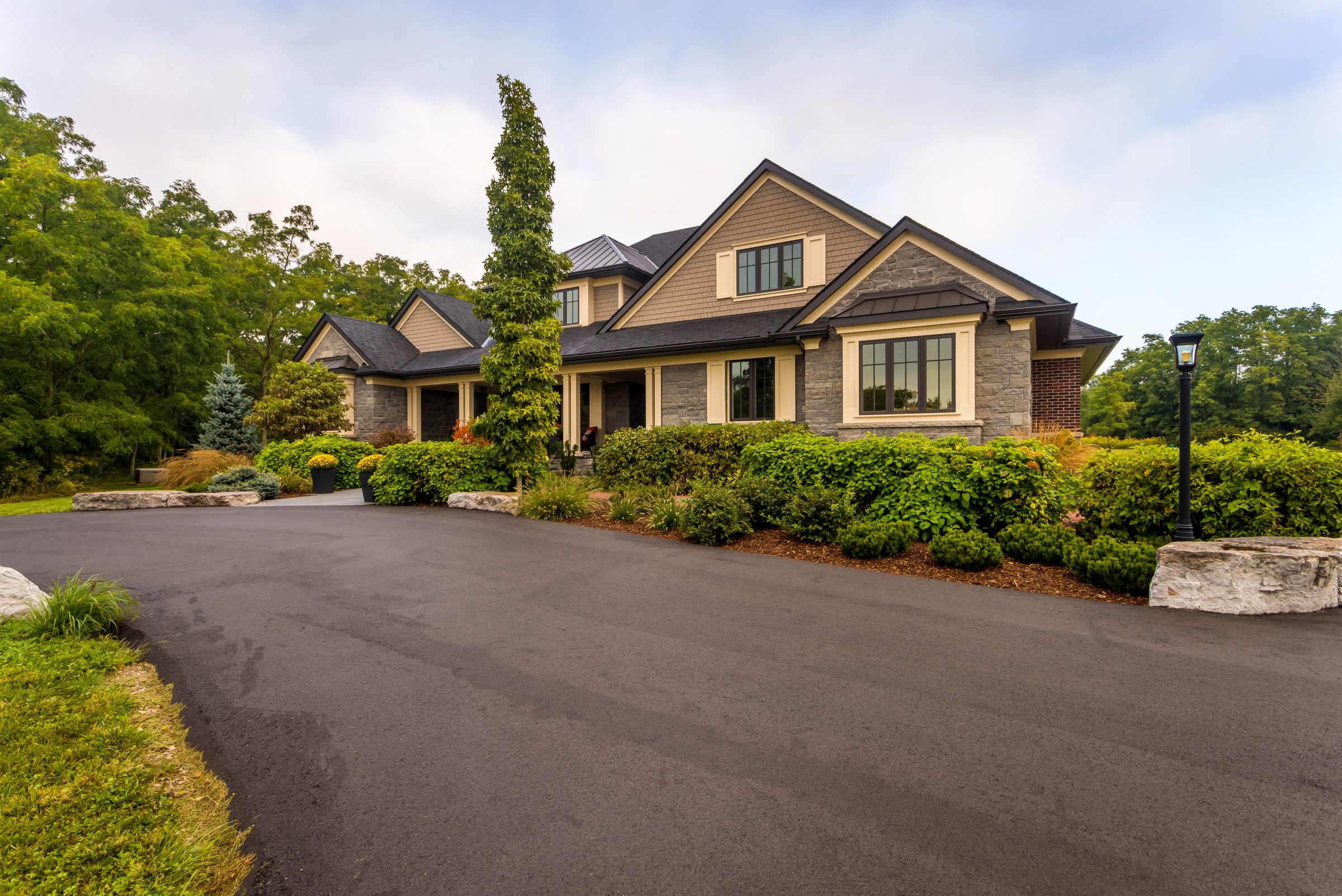 Modern suburban home with landscaped front yard.