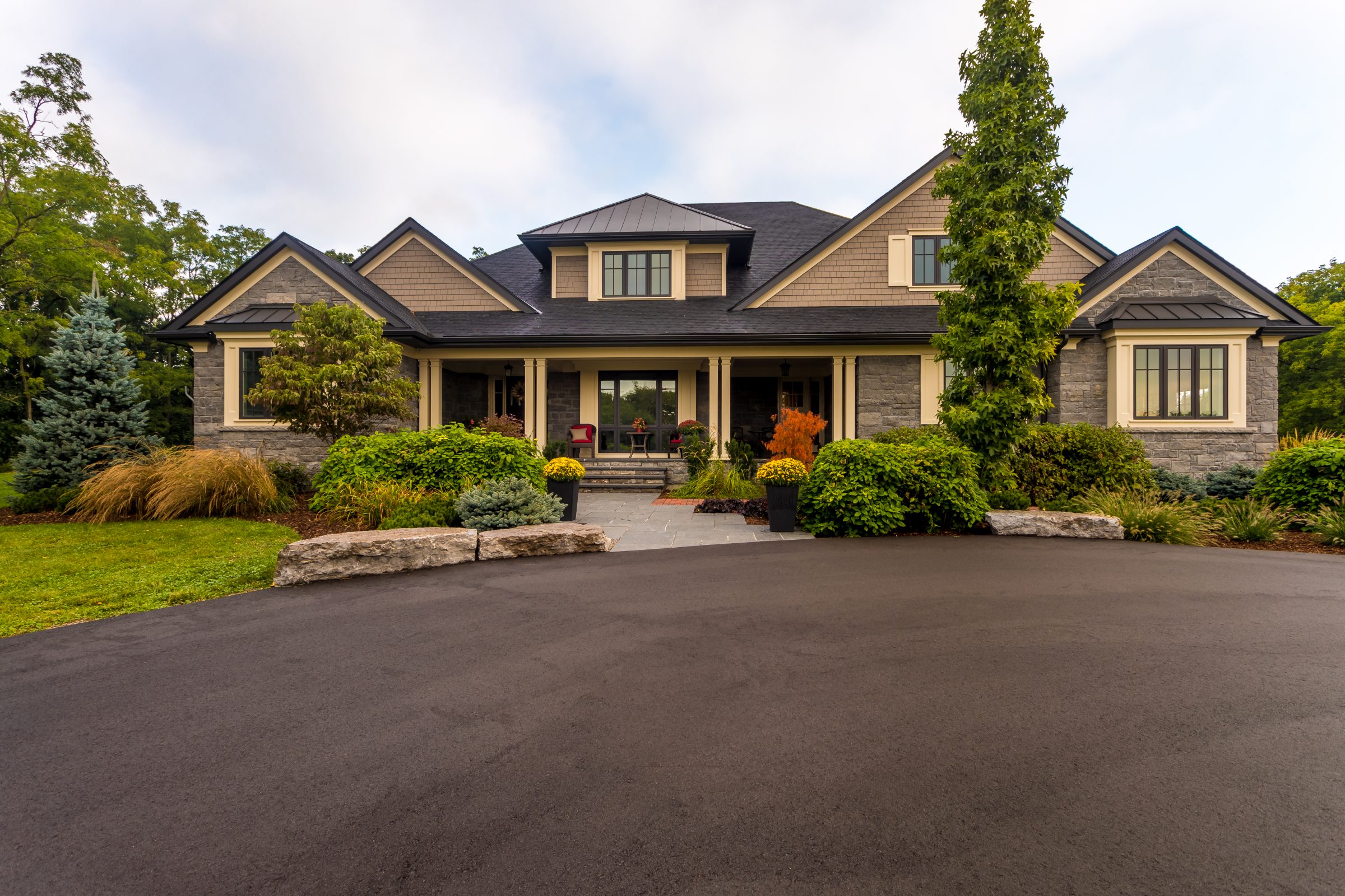 Modern suburban house with landscaped front yard