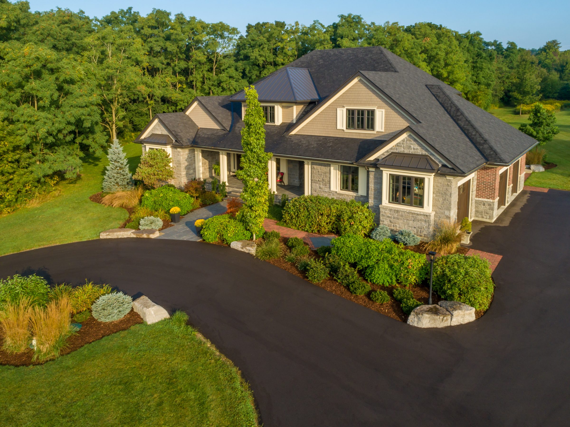 Modern suburban house with landscaped garden.